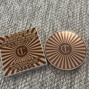 Charlotte Tilbury BEAUTIFUL SKIN SUN-KISSED GLOW BRONZER
2 MEDIUM